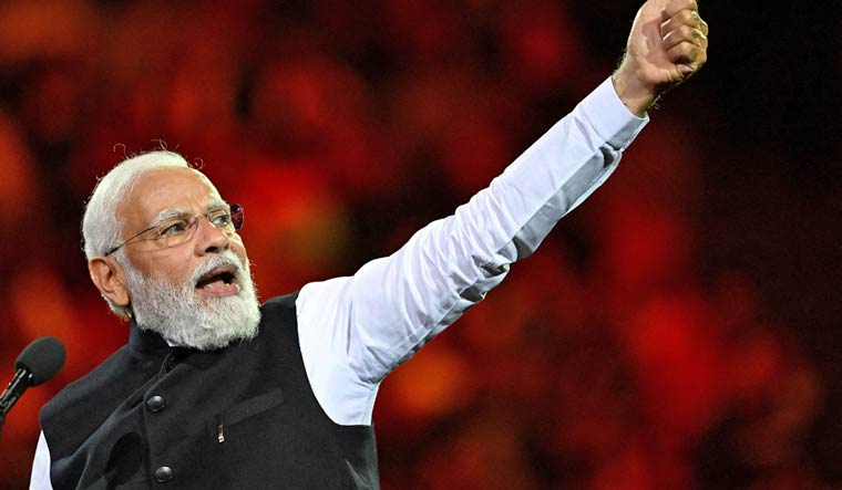 India's Prime Minister Narendra Modi addresses attendees during a community event at Qudos Bank Arena in Sydney, Australia May 23, 2023 | Reuters
