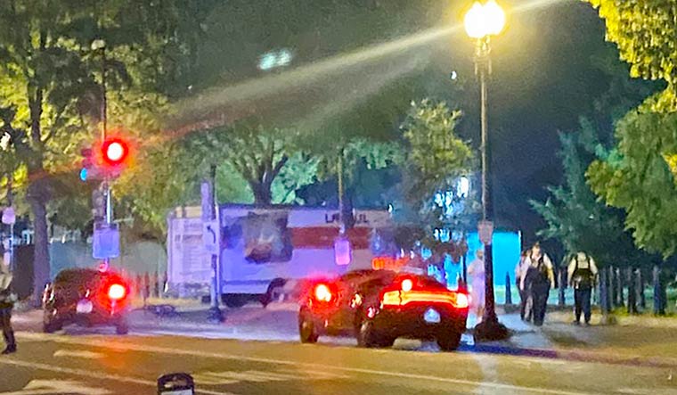 A box truck is seen crashed into a security barrier at a park across from the White House, Monday night, May 22, 2023 in Washington. Police have arrested a man they believe intentionally crashed a U-Haul truck into a security barrier near the north side of Lafayette Square late Monday night | AP