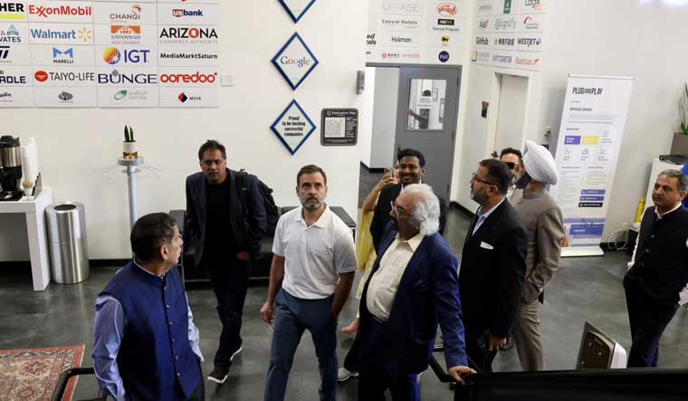 Congress leader Rahul Gandhi with Indian Overseas Congress Chairman Sam Pitroda and others at Plug and Play auditorium for an interactive session with 
Silicon Valley-based startup entrepreneurs, in California | PTI