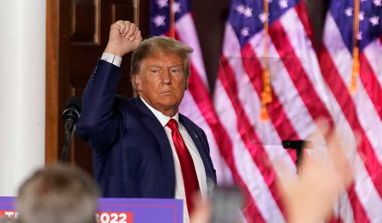 Former President Donald Trump gestures after speaking at Trump National Golf Club in Bedminster, N.J after pleading not guilty to federal charges | AP
