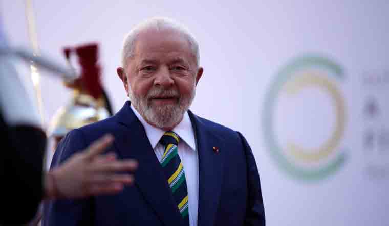 Brazilian President Luiz Inacio Lula Da Silva arrives for the closing session of the New Global Financial Pact Summit | AP