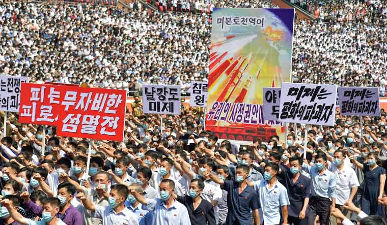 People attend a mass rally denouncing the U.S. in Pyongyang, North Korea, June 25, 2023 | Reuters