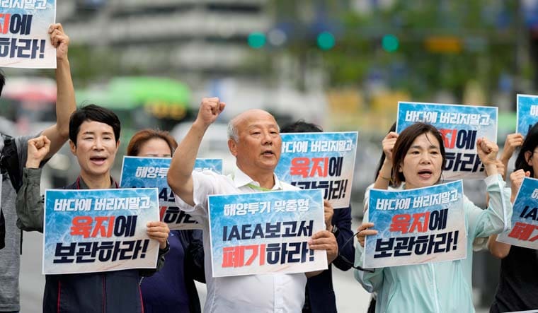 Members of civic groups shout slogans during a rally to oppose Japanese government's decision to release treated radioactive water into the sea from the Fukushima nuclear power plant, in Seoul, South Korea, Wednesday, July 5, 2023 | AP