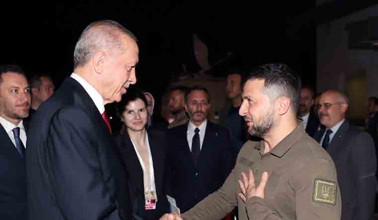 Turkish President Recep Tayyip Erdogan, left, shakes hands with Ukrainian President Volodymyr Zelenskyy at the end of their meeting in Istanbul | AP