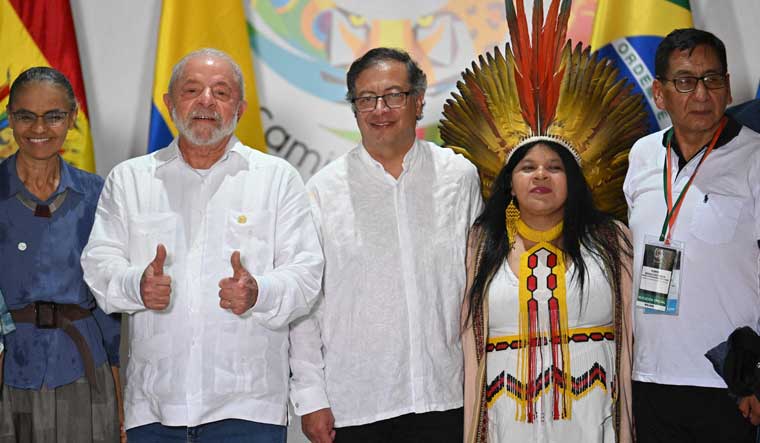  Brazilian Environment Minister Marina Silva, Brazilian President Luiz Inacio Lula da Silva, Colombian President Gustavo Petro and Brazilian Minister for Indigenous Peoples Sonia Guajajara pose for a picture after a meeting for talks on the protection of the Amazon Forest, in Leticia, Colombia | AFP