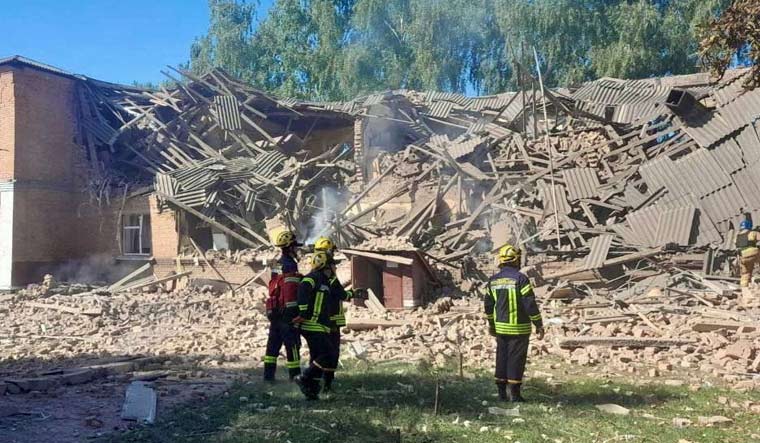 Rescuers work at the site of a Russian drone strike, amid Russia's attack on Ukraine, in Romny in Sumy region, Ukraine August 23, 2023 | Reuters