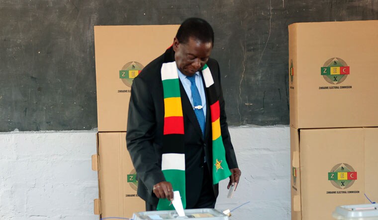 Zimbabwean President Emmerson Mnangagwa casts his vote at a polling station in Kwekwe, Zimbabwe, Wednesday, Aug. 23, 2023 | AP