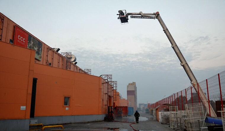 Firefighters work at a site of a shopping mall damaged during a Russian missile strike, amid Russia's attack on Ukraine, in Kyiv, Ukraine August 30, 2023 | Reuters