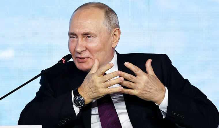  released by Roscongress Foundation, Russian President Vladimir Putin gestures while speaking at the Eastern Economic Forum in Vladivostok, Russia | AP