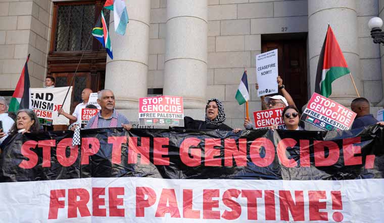 Pro-Palestinian supporters picket outside the High Court in Cape Town, South Africa | AP