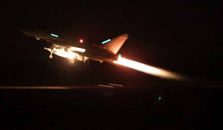 In this image provided by the UK Ministry of Defence taken on Thursday Jan. 11, 2024 shows an RAF Typhoon aircraft taking off from RAF Akrotiri in Cyprus, for a mission to strike targets in Yemen | AP