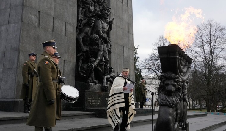 A rabbi say prayers on the eve of the 79th anniversary of the liberation of the Nazi German death camp of Auschwitz-Birkenau by Soviet troops