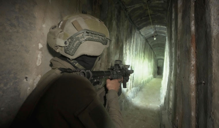 An Israeli soldier inside an underground tunnel found underneath Shifa Hospital in Gaza City | AP