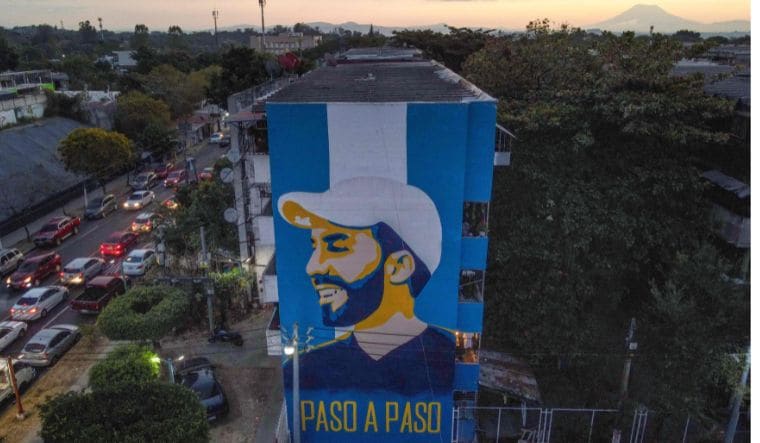 Aerial view of a mural at the Zacamil apartment complex depicting Salvadoran President Nayib Bukele, in Mejicanos, El Salvador, on January 26, 2024 | AFP