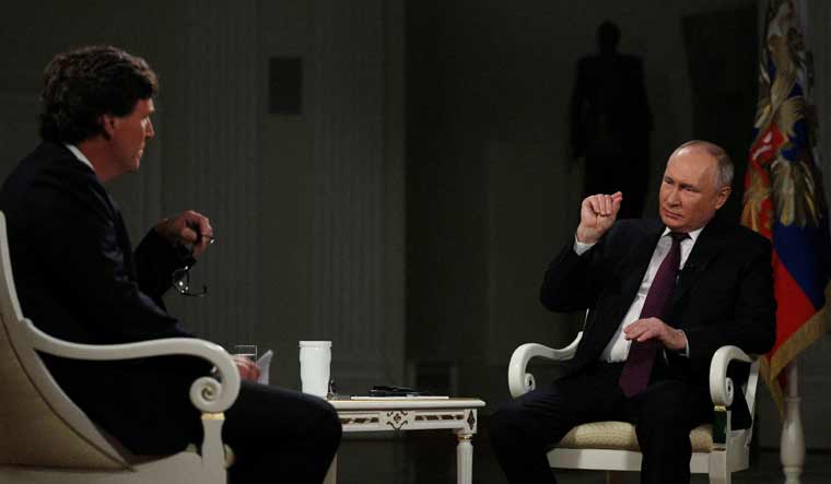 Russian President Vladimir Putin speaks during an interview with U.S. television host Tucker Carlson in Moscow| Reuters
