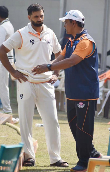 Nabi with bowling coach Krishna Kumar