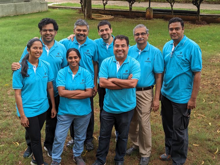 Team spirit: Shridhar Narayanan (second from right) and Narayanan Venkatasubramanian (second from left; back row) with the Peptris team.
