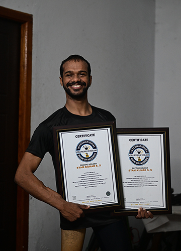 Certified adventurer: Kumar with his International Book of Records certificates | Sreelakshmi Sivadas Menon