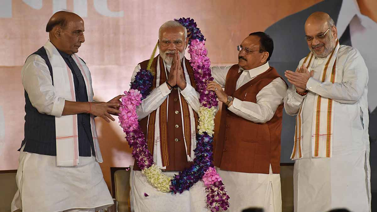 Leading from the front: Prime Minister Modi being felicitated by (from left) Union Minister Rajnath Singh, BJP president J.P. Nadda and Union Minister Amit Shah at the party headquarters in Delhi on October 8 | Kritajna Naik
