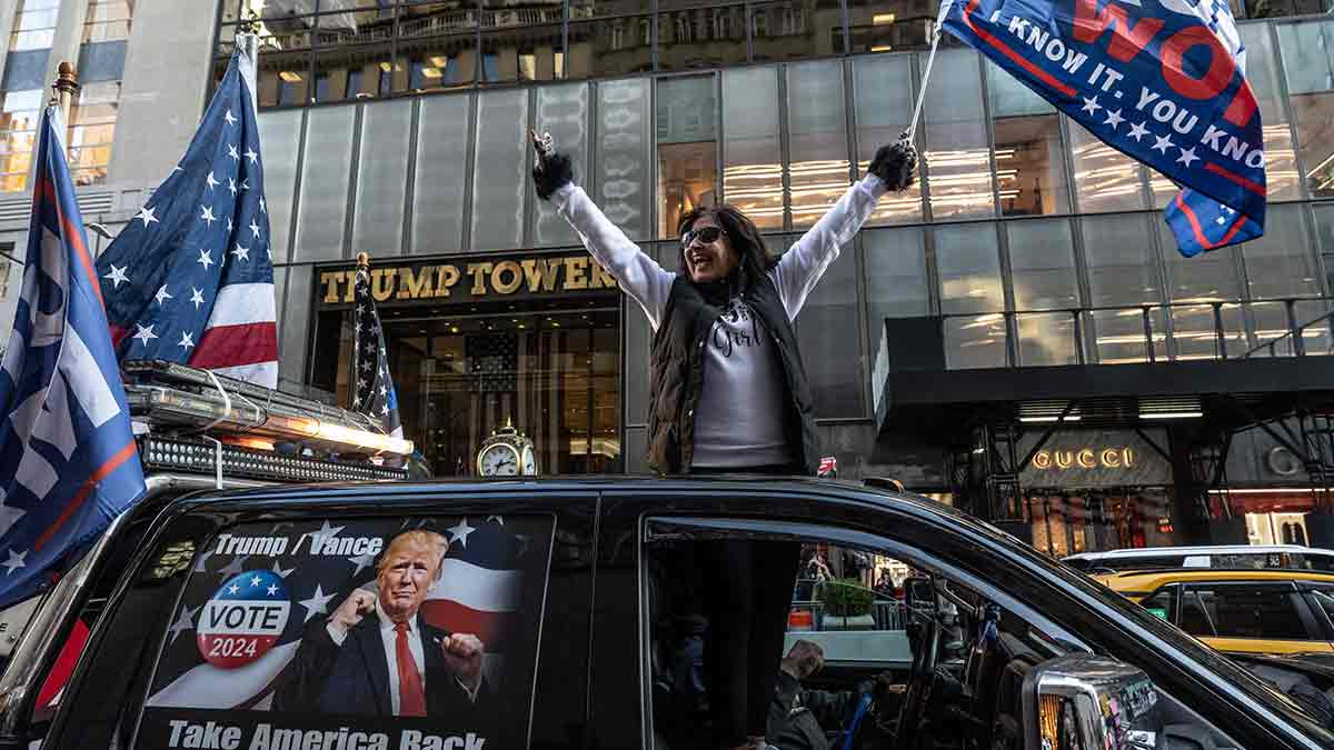 Winning move: A Trump supporter in New York celebrating his victory | AFP