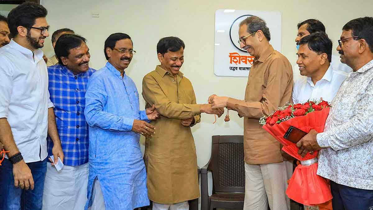 Sudden switch: Uddhav Thackeray welcomes Rajan Teli, long-time aide of BJP MP Narayan Rane, after he quit the BJP to join the Shiv Sena (UBT) | PTI