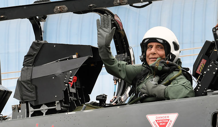 Flying high: Rajnath preparing to take off on the Tejas fighter, at  the HAL airport in Bengaluru | Bhanu Prakash Chandra