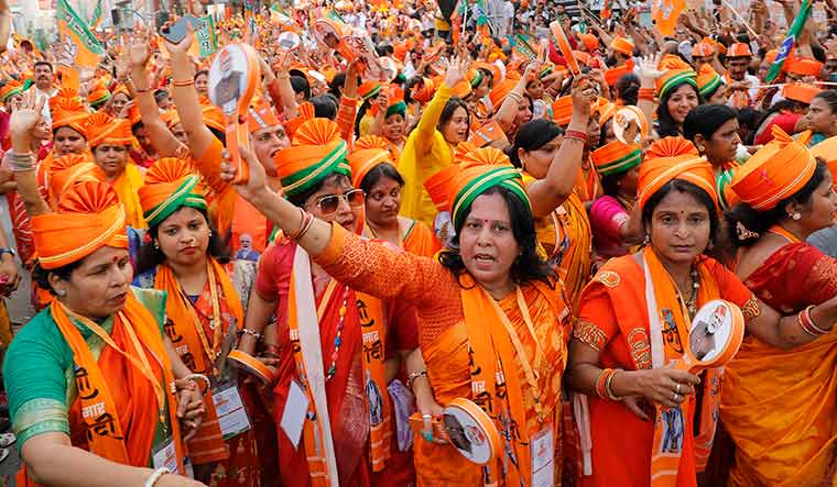 Saffron tide: Supporters during Modi’s road show in Varanasi on May 13 | Pawan Kumar