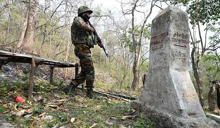 Forest vigil: An Assam Rifles personnel patrolling the India-Myanmar border.