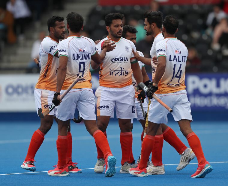 Making their own legacy: Captain Harmanpreet (middle) with his teammates during a match this June | Getty Images