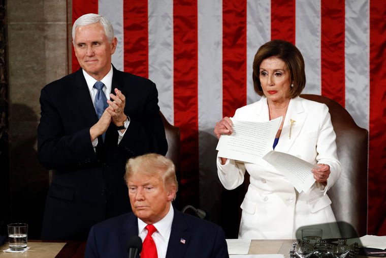 Protest in motion: Nancy Pelosi tears her copy of president Donald Trump’s State of the Union address after he delivered it to a joint session of Congress on February 4, 2020. Also seen is vice president Mike Pence | AP