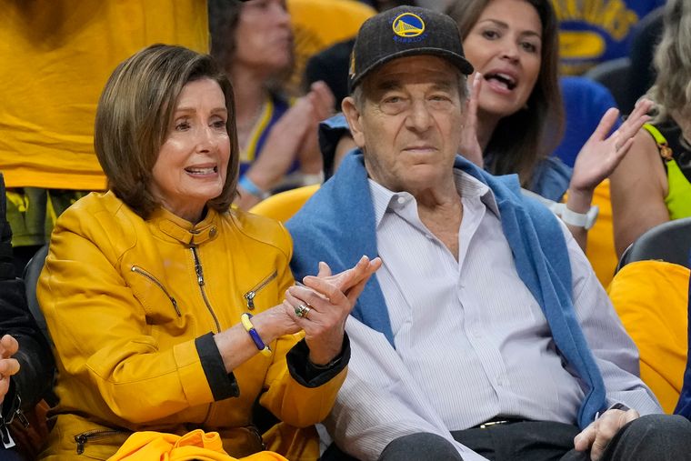 Bouncing back: Pelosi with her husband, Paul, at the NBA basketball playoffs in San Francisco in April 2023 | AP