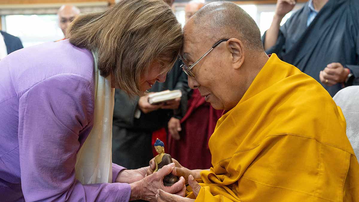 Mutual respect: The Dalai Lama exchanges greetings with Nancy Pelosi at Dharamsala | Reuters