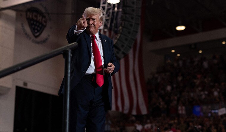 Attack unlimited: Trump leaves the stage after speaking at a rally in St Cloud, Minnesota. No Republican has won the state since 1972 | AFP