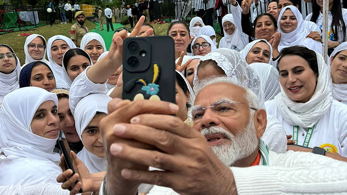 Making it click: Modi after practising yoga on the International Yoga Day in Srinagar on June 21 | PTI