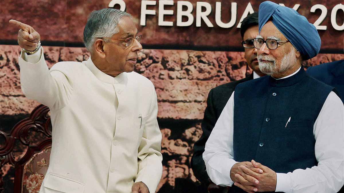 Global leader: Prime Minister Manmohan Singh with M.K. Narayanan, West Bengal governor, in Kolkata in February 2014 | PTI