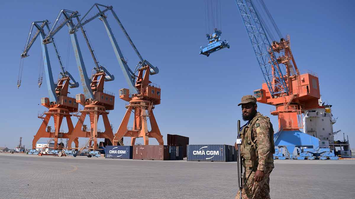 Ready to fire: A Pakistani soldier standing guard at the Gwadar port | AFP