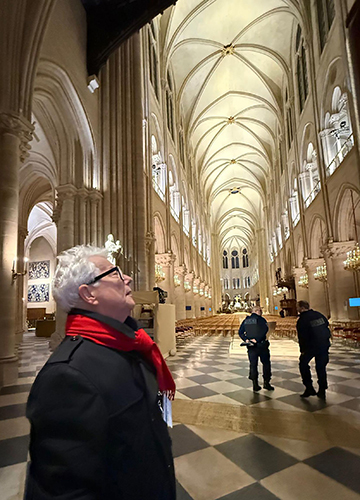 The master builder: Follett inside the Notre Dame after the cathedral officially reopened | X@KMFollett