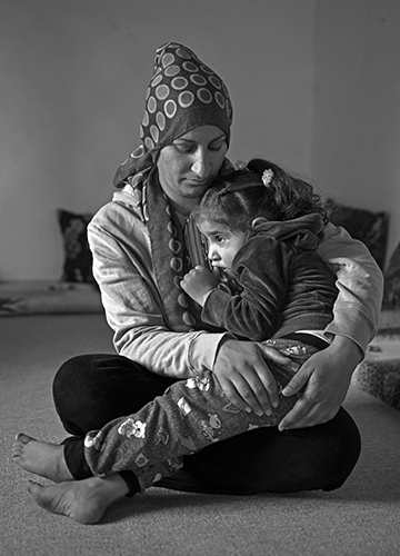 Staying alive: Mizgin Bakr Mohammed with her daughter Ameena at a temporary house offered by villagers at Suhel near Qamishli | Bhanu Prakash Chandra