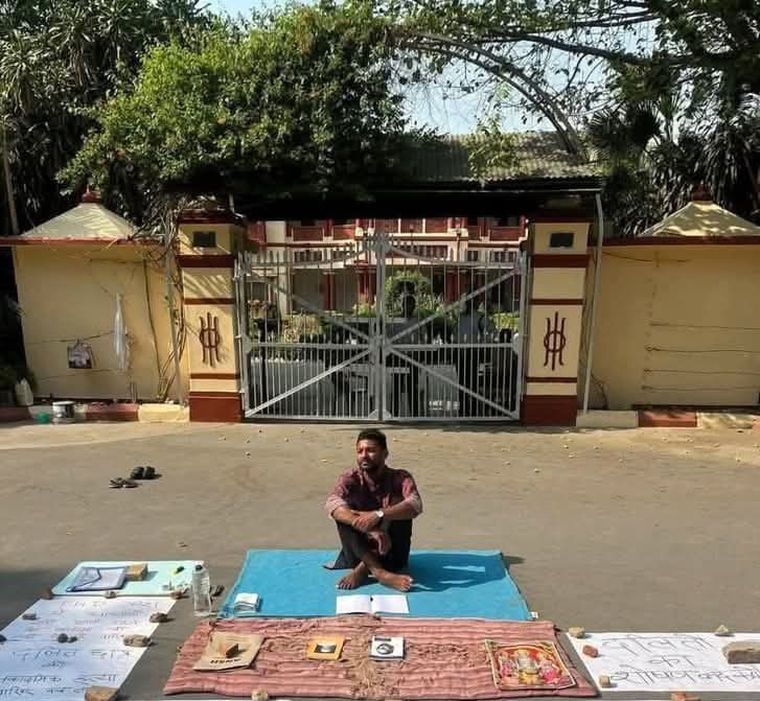 Topper with no seat: Shivam Sonkar, a dalit student, outside the Banaras Hindu University. Despite securing second place in the entrance exam in the general quota, BHU denied him admission to its PhD programme| X@ambedkariteIND