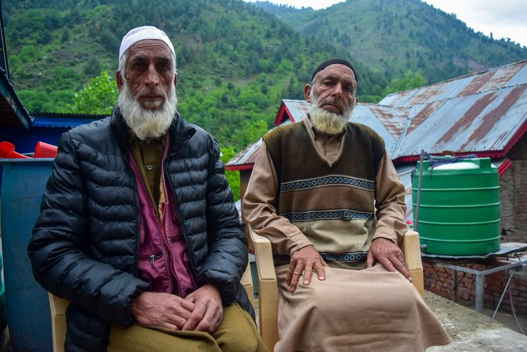Living in the line of fire: Balkote residents Muhammad Yakoob (left) and Muhammad Sidiq | Arsalan Ashiq