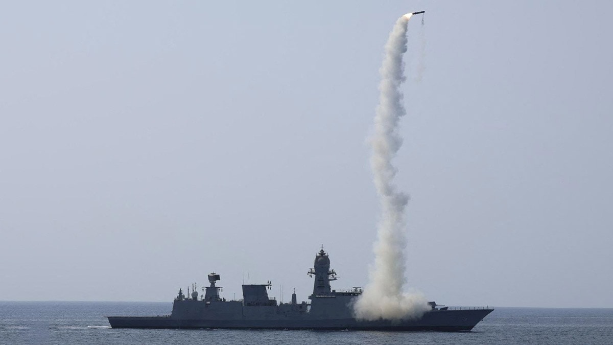 Target acquired: A Navy ship fires a projectile during a test fire on April 27 | Reuters