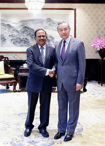 Fresh start: NSA Ajit Doval with Chinese top diplomat Wang Yi during a meeting in Beijing on June 23 | PTI