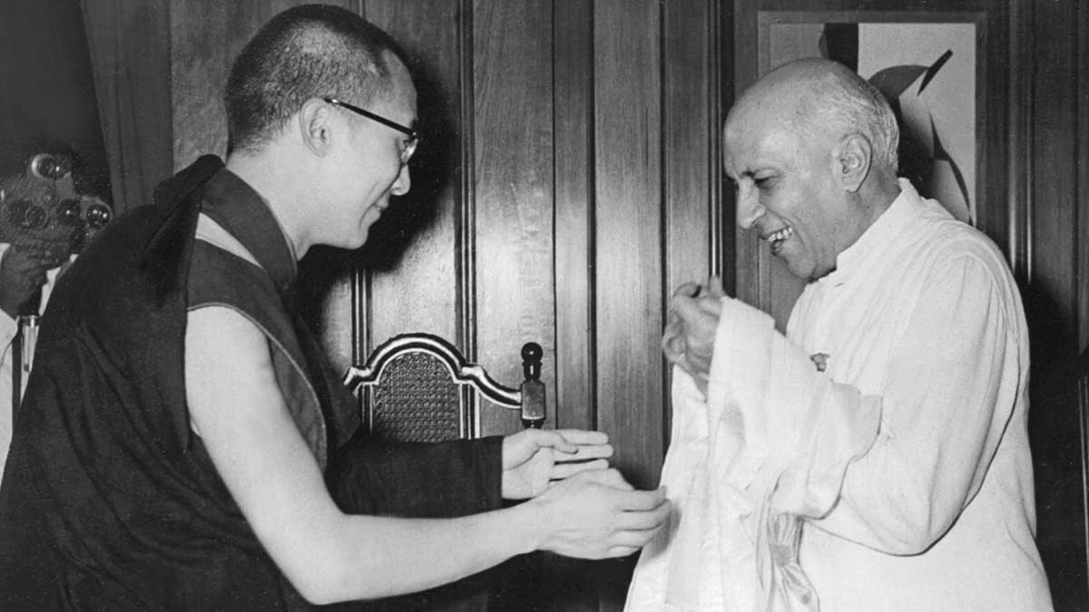 Warm vibes: In this picture taken on September 7, 1959, the Dalai Lama is seen with prime minister Jawaharlal Nehru in New Delhi | AFP