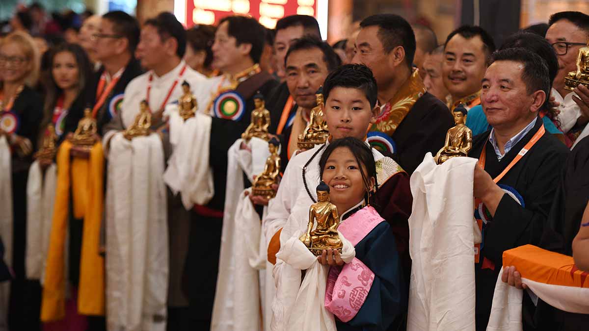 51-Tibetan-people-line-up-at-Dharamsala