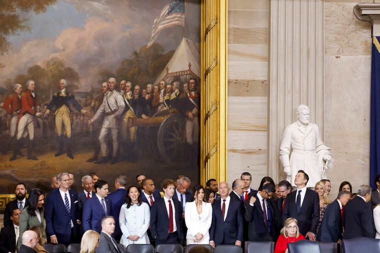 Full circle: US Secretary of State Marco Rubio (second from left in the front row of standing guests) with Mark Zuckerberg of Meta (fourth from left), Jeff Bezos of Amazon (sixth), Sundar Pichai of Alphabet (seventh) and Elon Musk of Tesla (eighth) in the rotunda of the US Capitol during Trump’s inauguration as president on January 20, 2025. Behind is a painting depicting the surrender of British forces to the US army after the Battle of Saratoga—a decisive win that eventually ended colonial rule in America | Getty Images