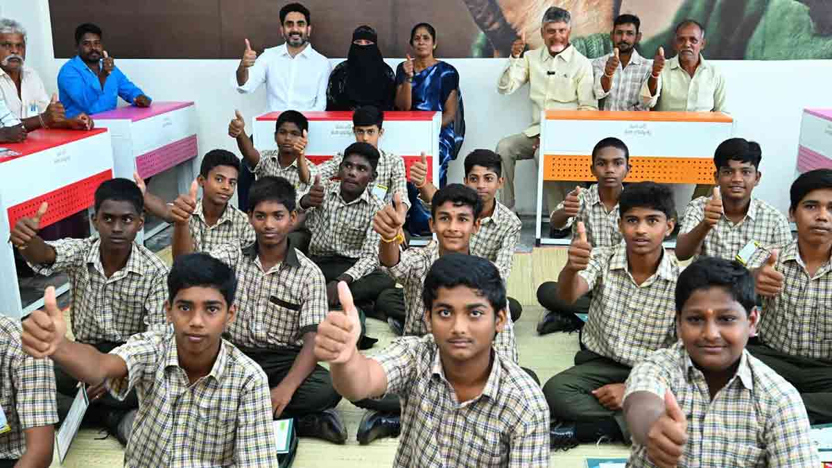 Pushing for progress: Lokesh (wearing white shirt in the back row) and Naidu (back row, third from right) during the “mega parent-teacher meeting” in schools on July 10 that entered the Guinness Book of World Records | Instagram@Naralokesh