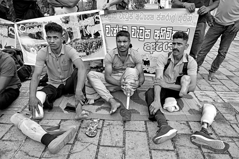 Former soldiers protest outside the presidential office in Colombo, demanding a better quality of life.