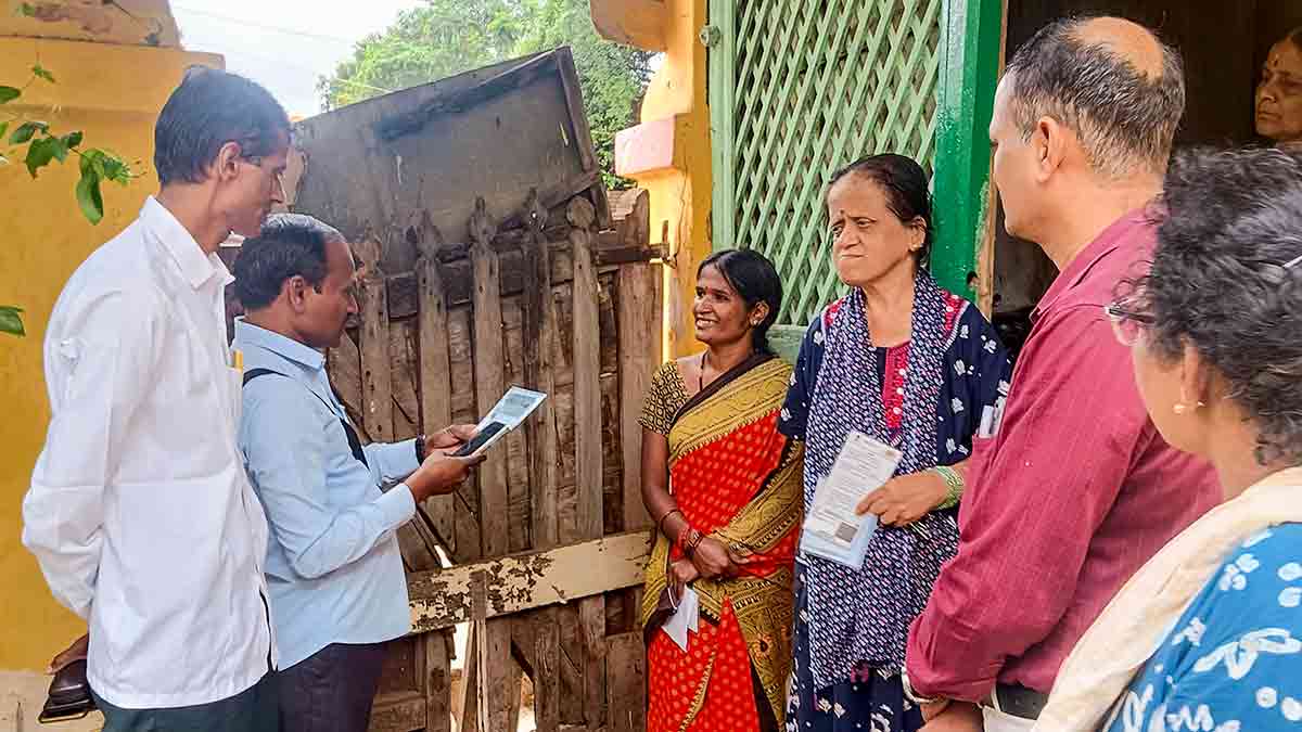 Getting it right: Officials interact with a family in Hubballi during the Karnataka caste census last September | PTI
