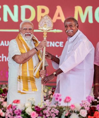 Hand in hand: N. Rangasamy with Prime Minister Narendra Modi at a foundation stone-laying ceremony in Puducherry | PTI