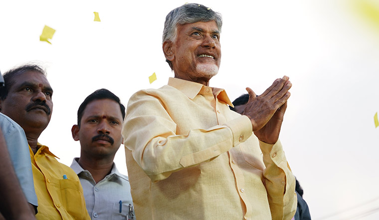 23-Chandrababu-Naidu-greets-supporters-during-a-campaign-event